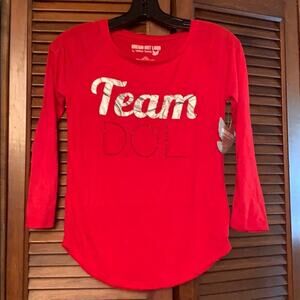 Selena Gomez Dream Out Loud Red Graphic Tee Juniors XS NWT Team DOL Long Sleeve